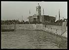 Crowded Pier and Droit House  [slide]